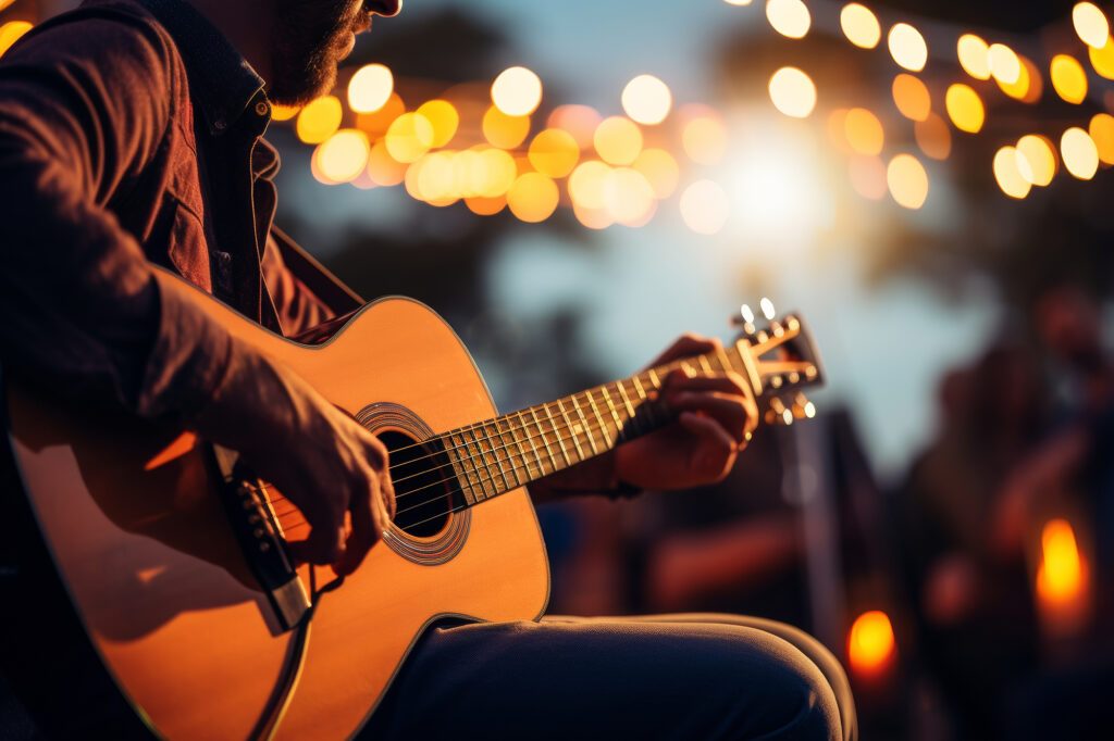 close up of a musician now solo guitar playing a concert on a club stage with bokeh light in concert